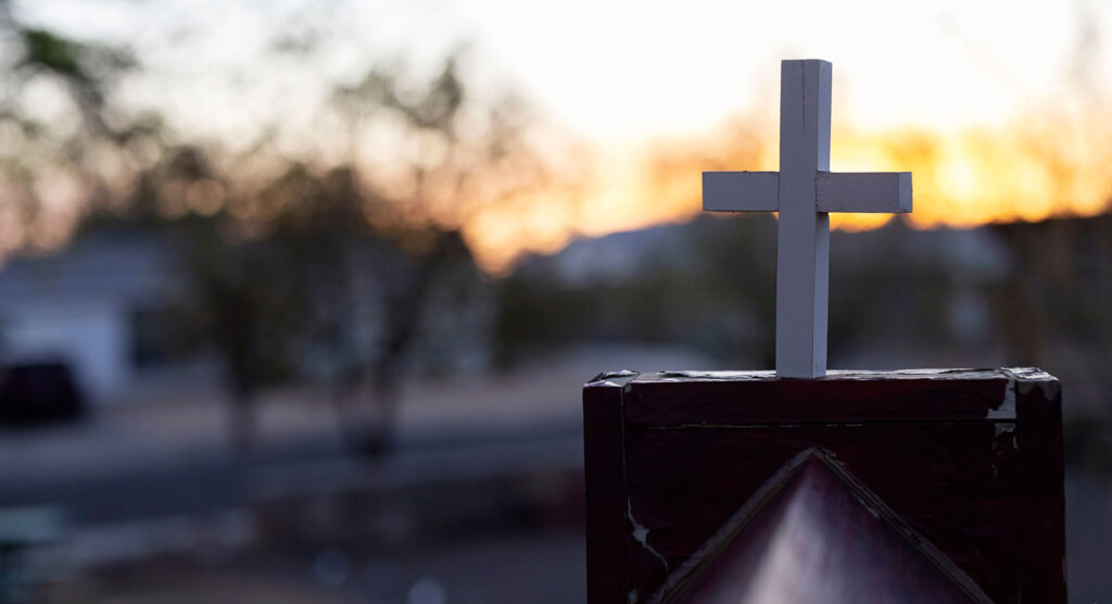 a cross in the University United Methodist Church's community garden